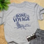 Bone Voyage Skeleton on Chair T-Shirt